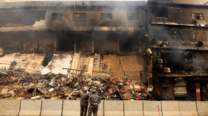 Dozens missing as death toll rises to 26 in Karachi shopping centre fire