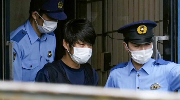 Japan court hands ex-PM Abe's assassin life sentence, NHK reports