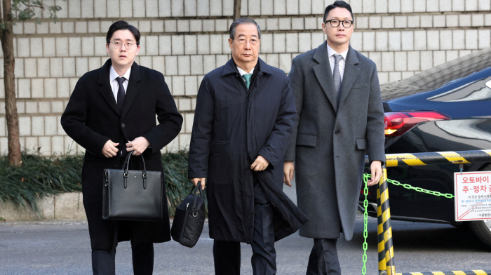 Former South Korean PM Han Duck-soo sentenced to 23-years in case related to martial law