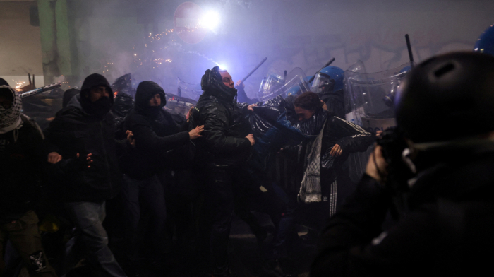 Police clash with protesters in Milan during Winter Olympics