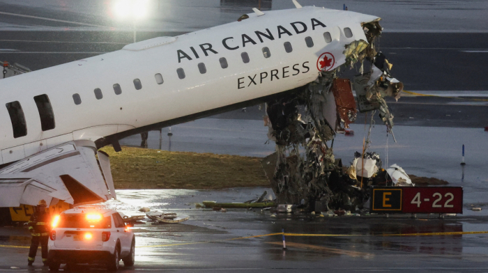 Two dead as Air Canada Express plane hits ground vehicle at New York's LaGuardia airport