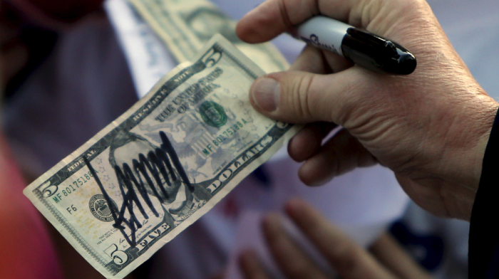 Trump's signature to be on U.S. dollar bills, a first for a sitting president