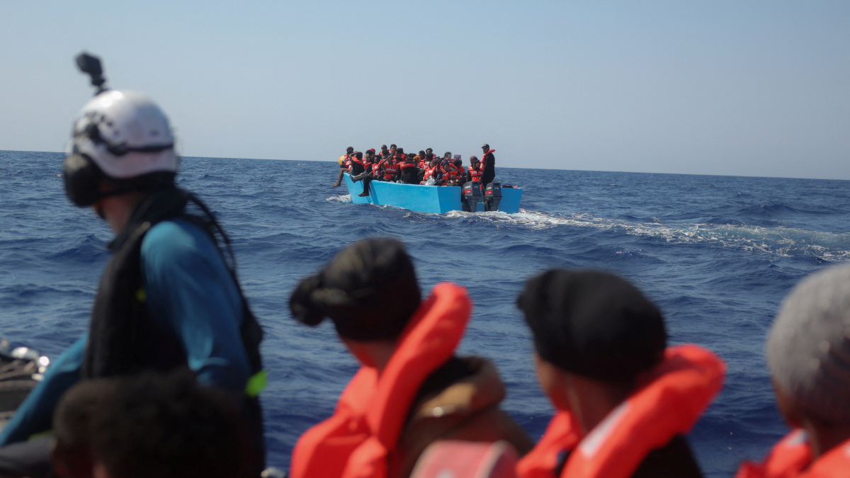 At least 70 missing and two bodies recovered after migrant boat capsizes in the Mediterranean
