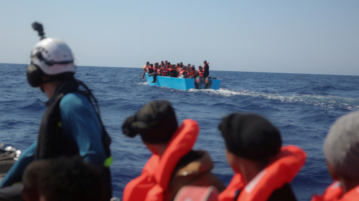 At least 70 missing and two bodies recovered after migrant boat capsizes in the Mediterranean