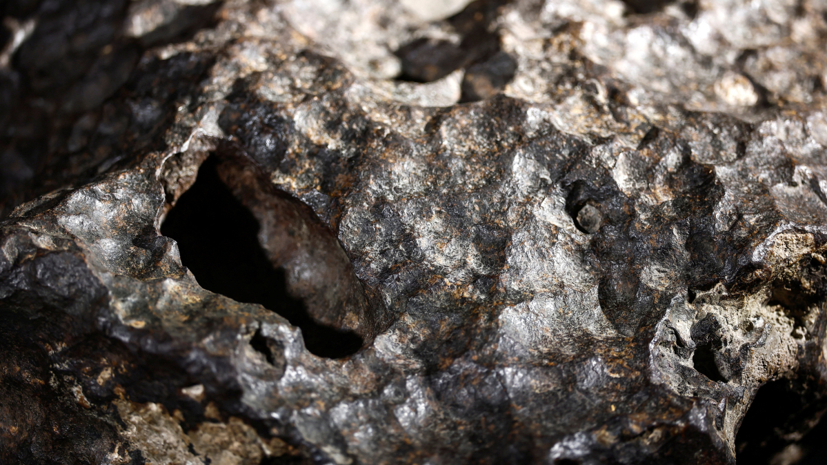 Discovery of 3,000-year-old axe at China's ancient Sanxingdui ruins, believed to be made from a meteorite