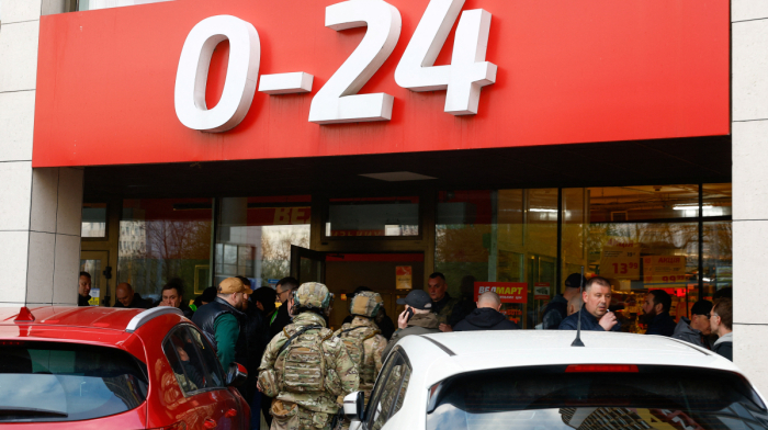 At least five killed in Kyiv supermarket shooting as police shoot dead Moscow-born attacker