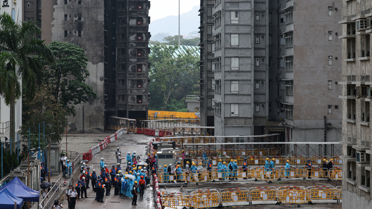 Hong Kong fire survivors return to homes months after deadly blaze