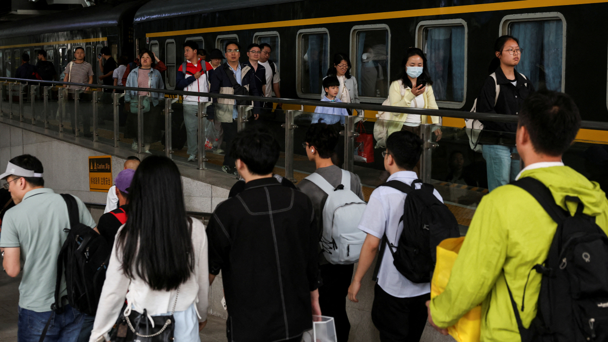 China adopts landmark law to strengthen support for low-income families