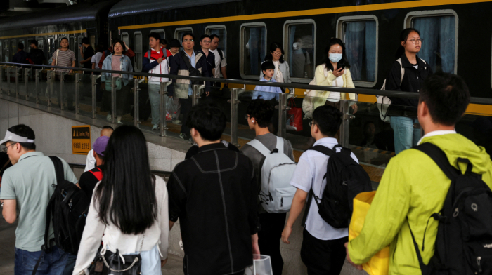 China adopts landmark law to strengthen support for low-income families