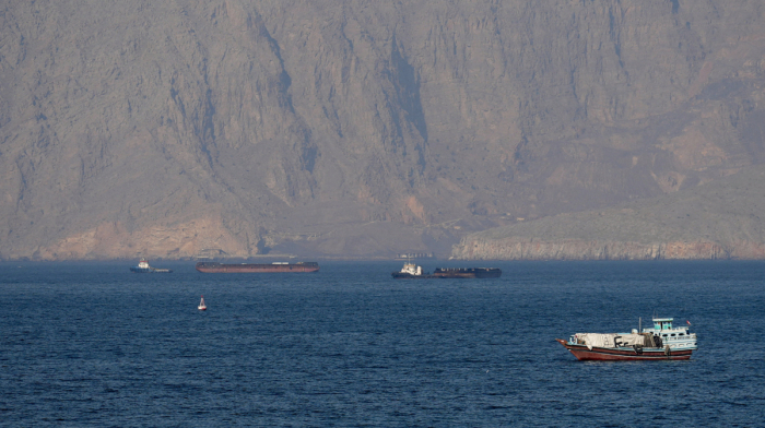 U.S. to help ships stranded in Strait of Hormuz as tanker hit by projectiles