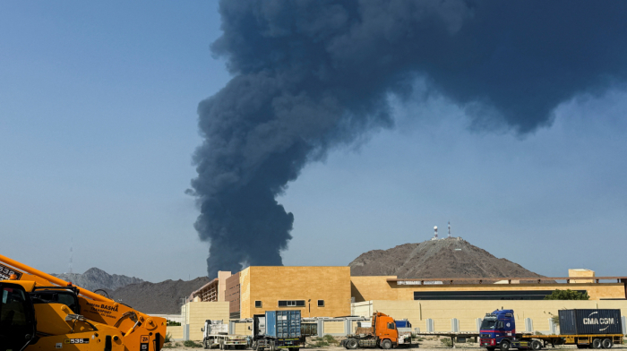 UAE reports second day of Iranian missile and drone attacks, as Tehran's military issues denial