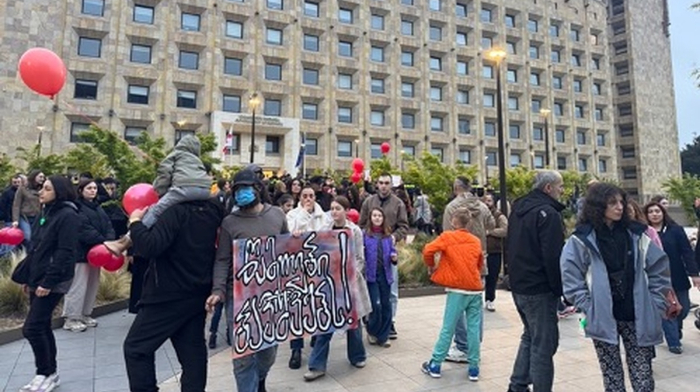 'Give our kids the medicine': Georgian parents are sleeping in the rain for the right to keep their sons alive