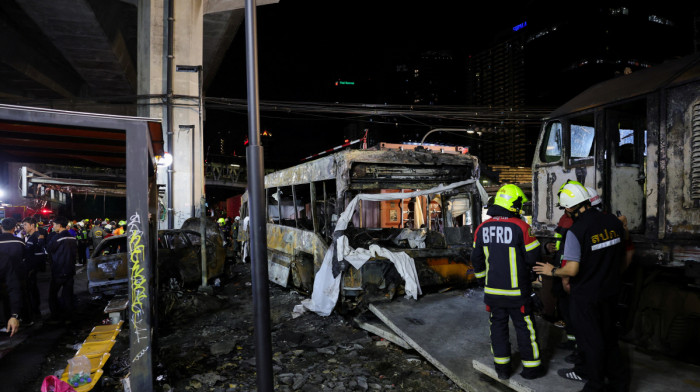 Eight killed and dozens injured after freight train hits bus in Thailand