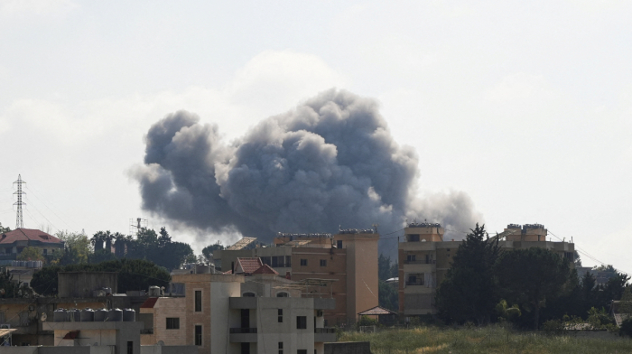Israel intensifies strikes on Lebanon as fighting with Hezbollah escalates across border