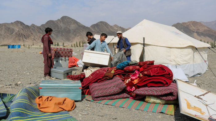 At least 22 killed as truck carrying Afghan returnees overturns