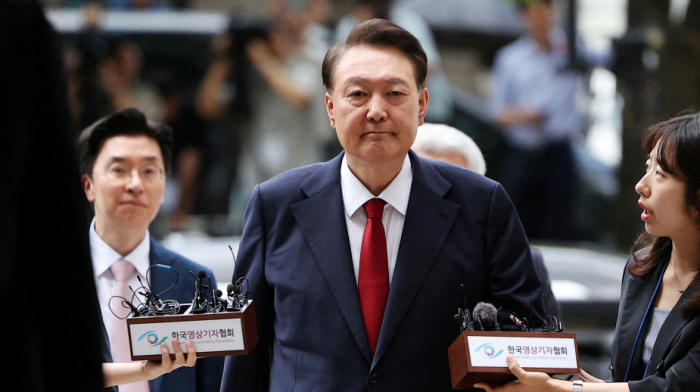 South Korea court sentences ex-president to 30 years