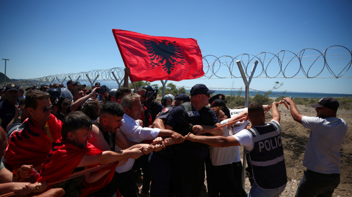 Albanian demonstrators tear down fences in anti-development protests