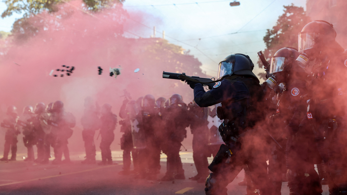 G7 protest turns violent in Geneva as police fire teargas ahead of summit