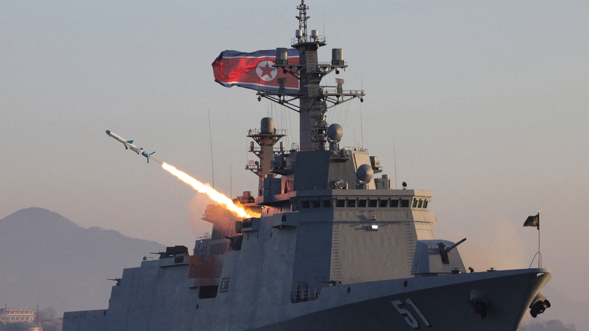 North Korea to build two large warships a year, Kim Jong Un says