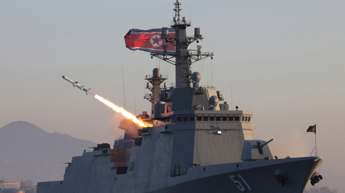 North Korea to build two large warships a year, Kim Jong Un says