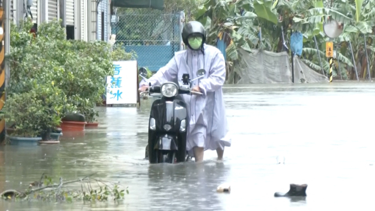 Typhoon rains shut down southern Taiwan, flood rail links
