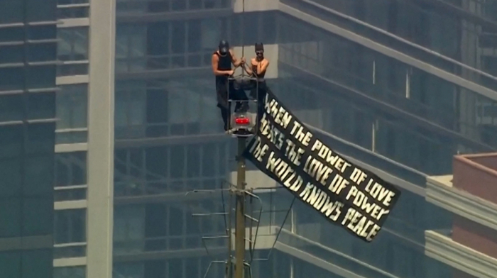 Russian couple climb Empire State Building in marriage proposal stunt