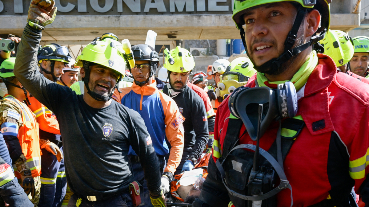 Venezuela rescuers save man trapped in collapsed mall for more than a week