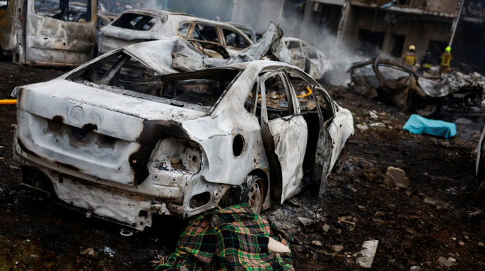 Russian attack on Kyiv kills at least nine as rescue efforts continue
