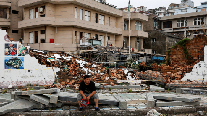 Typhoon Bavi batters eastern China prompting nearly two million evacuations to safety, threatens days of rain