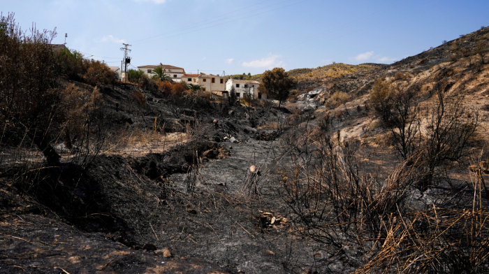 British woman's death raises Spain wildfire toll to 13 people