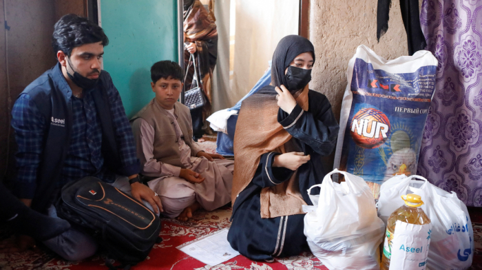Afghan aid groups struggle to keep women working under Taliban restrictions