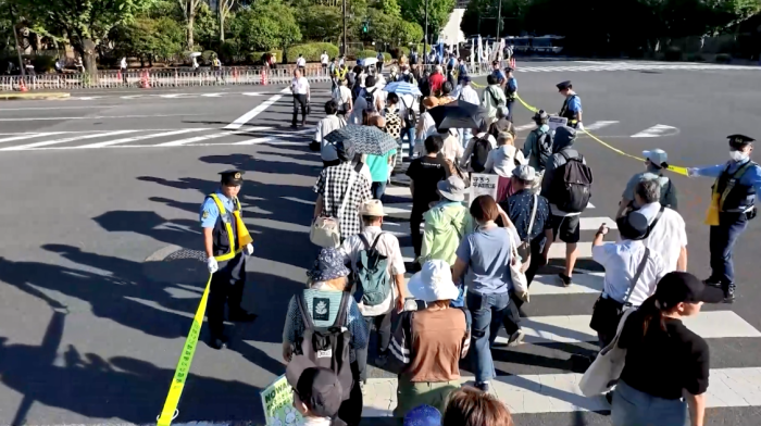 Thousands protest Japan's defence reforms as Takaichi's approval hits record low