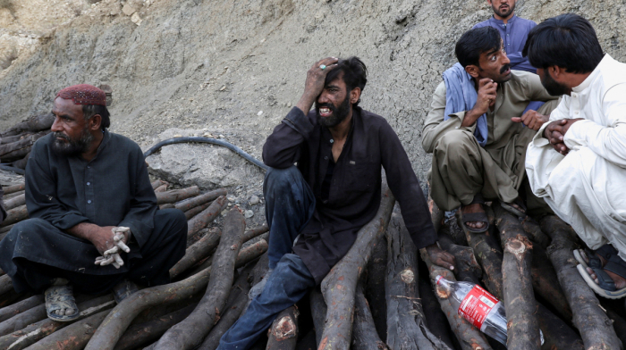 Pakistan coal mine blast leaves at least 18 dead as 14 remain trapped