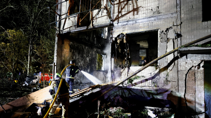 Russia pounds Kyiv with missiles, killing at least three