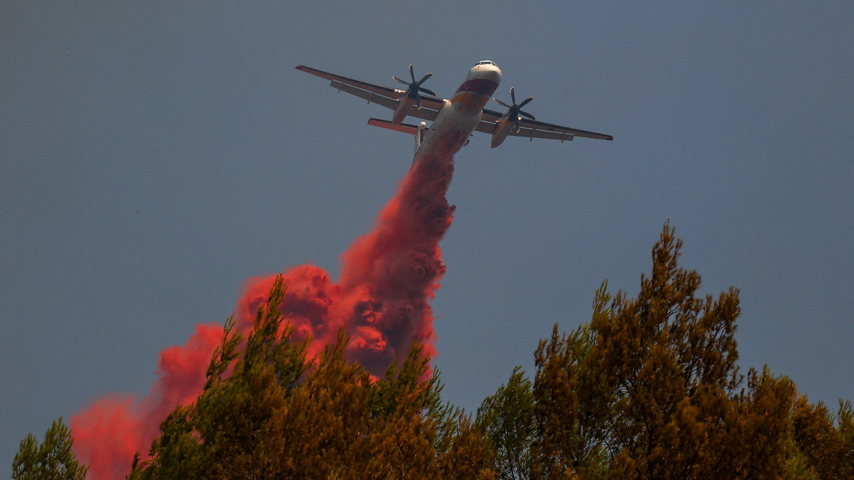 Wildfires rage in Greece as firefighters battle blazes in France and Spain