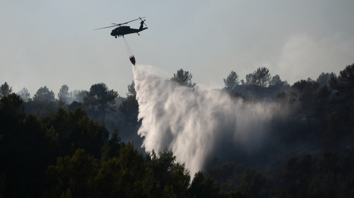 France says wildfires under control as Greece and Spain continue battling flames