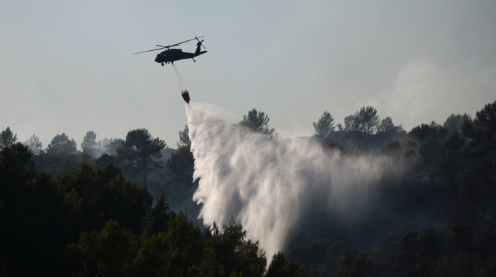 France says wildfires under control as Greece and Spain continue battling flames