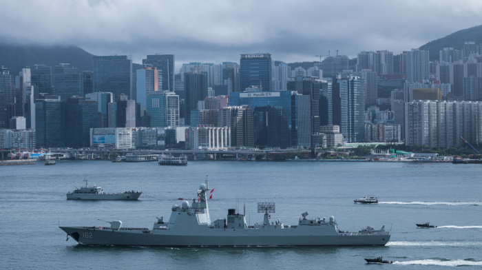 China steps up strategic pressure as global attention shifts