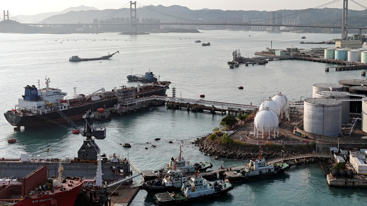China steps up strategic pressure as global attention shifts