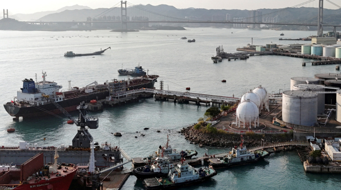 China steps up strategic pressure as global attention shifts