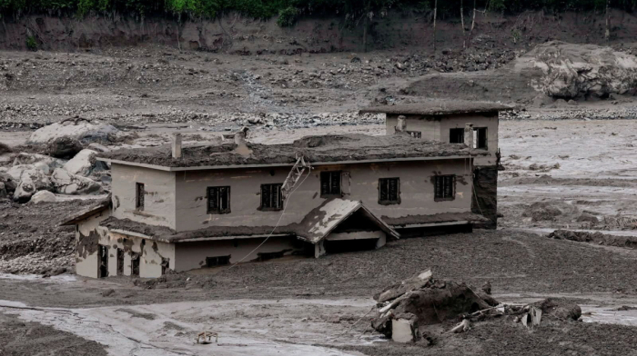 Landslide on Nepal-China border triggers deadly floods