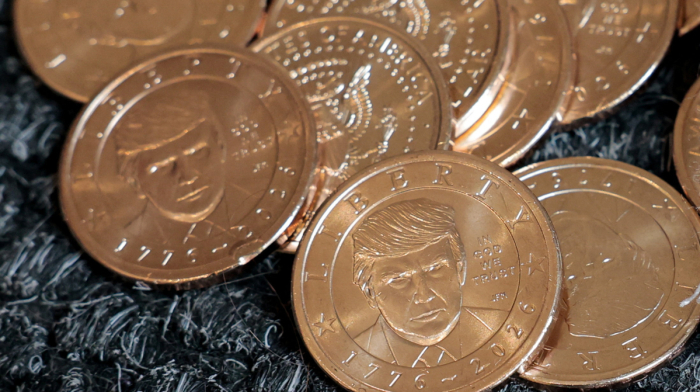 Trump’s face enters U.S. pockets on new $1 anniversary coin