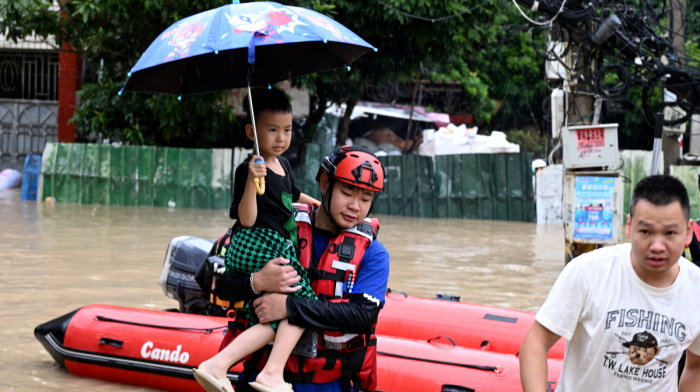 Typhoon Saudel floods southern China as more torrential rain looms