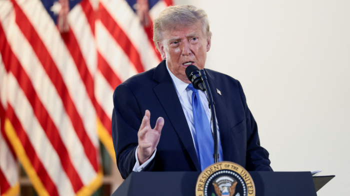 Trump urges Fed to cut rates, threatens to halt trade with deficit countries