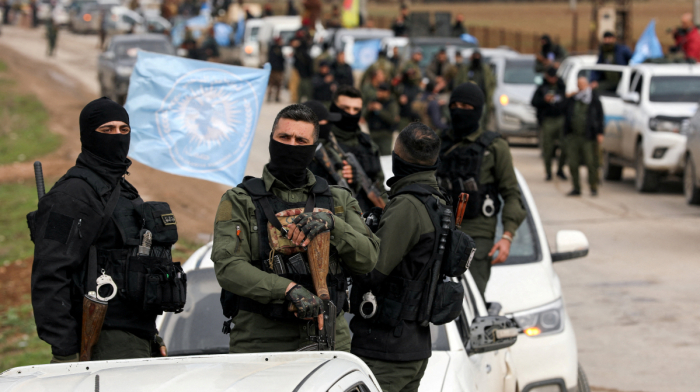 Syria says armed factions integrated into national army as government pushes state control
