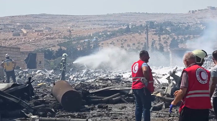 Explosion at Syrian weapons depot kills 14