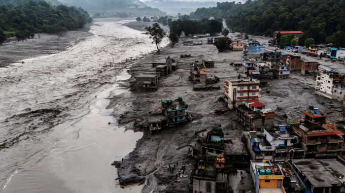 Nepal urges villagers to evacuate to safety after flood triggered by landslide