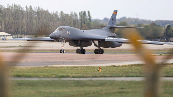 UK prosecutors charge 2 men with helping Iran over air base incident