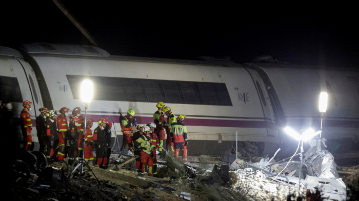 Spanish rescuers search trains in hope of finding survivors of deadly crash